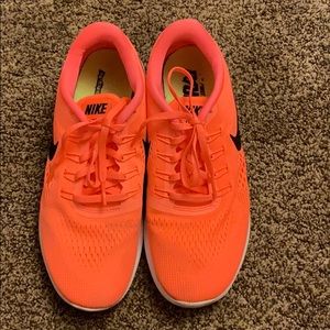 Orange Nike Free Runs
